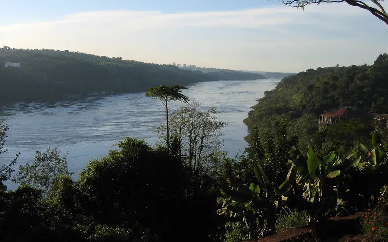 The river runs lazily along the border
