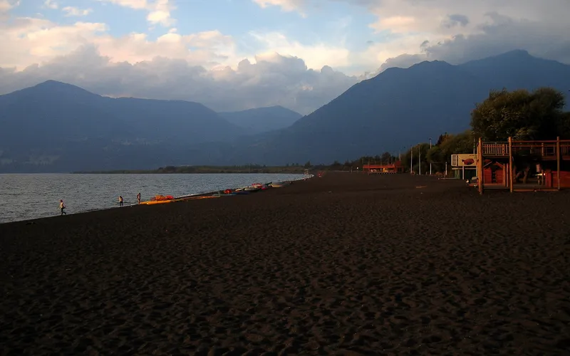 Sunset on the black sand beach at Lago Villarica