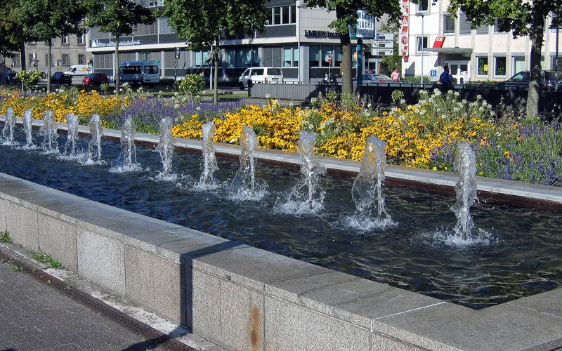 Fountains and flowers along a main street