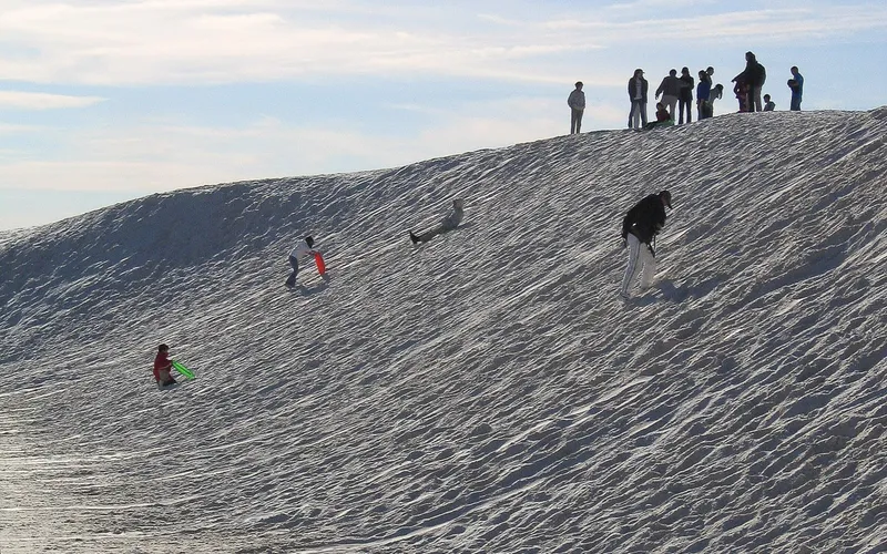 Sledding on the sand dunes