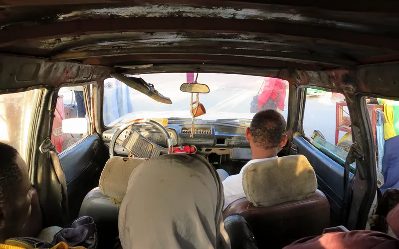 Leaving Saint-Louis in a battered car for the border