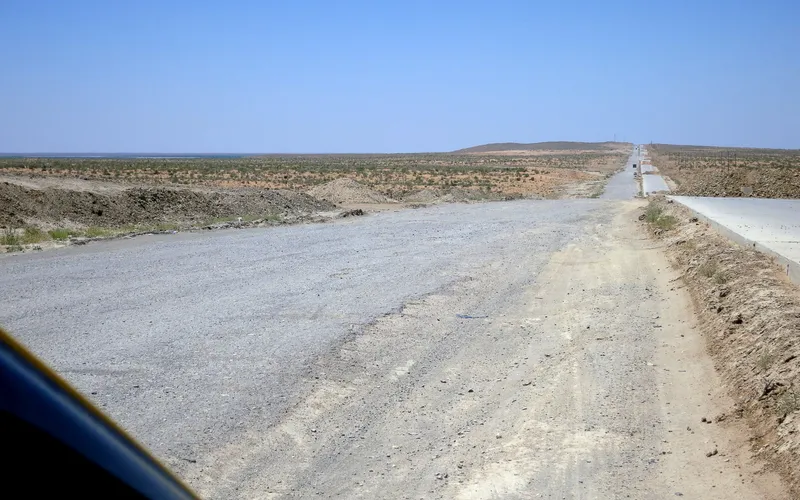 A beautiful new road next to the dirt track