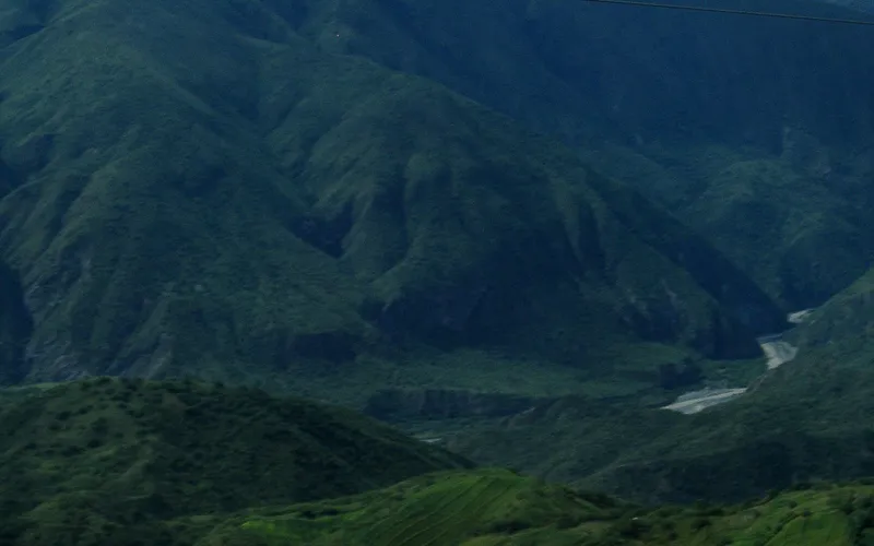 The clouds resting on top of the mountains