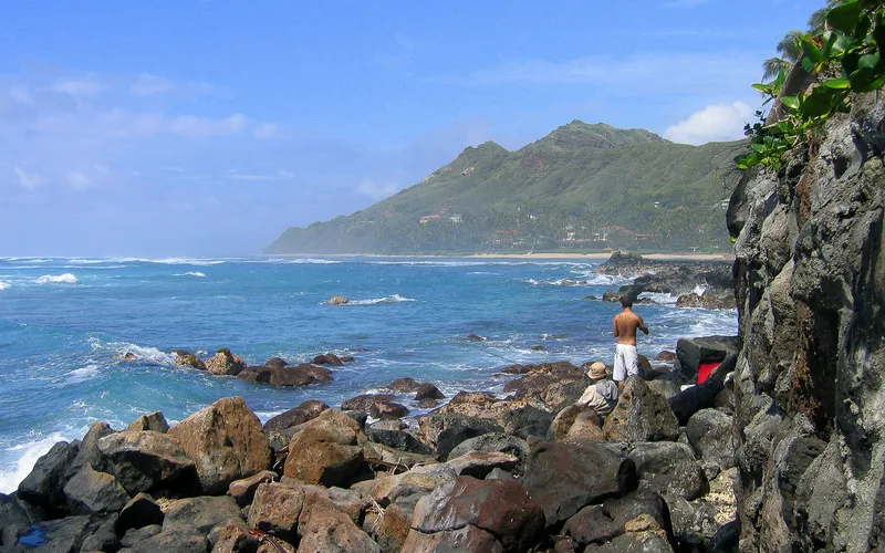 Fishermen on the rocky coast