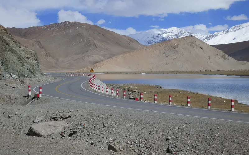 The Karakorum Highway running along the lake