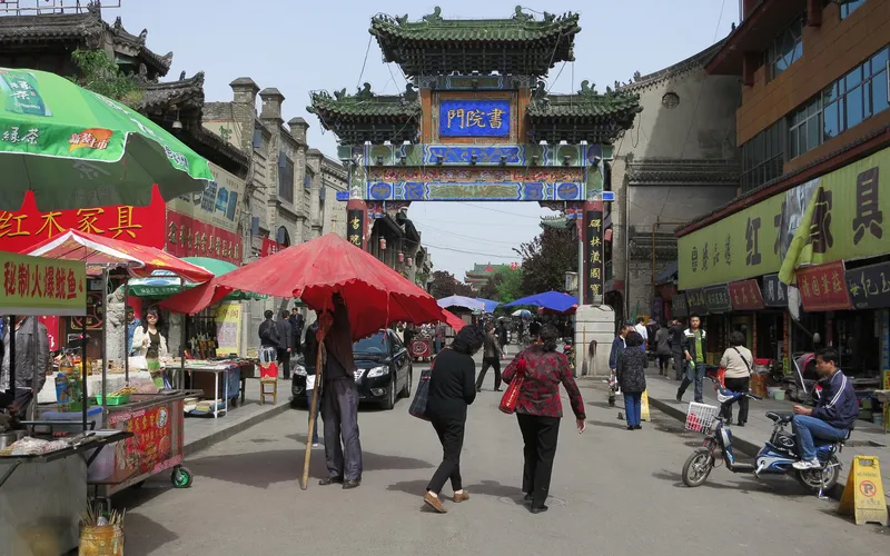 A gate on the market lined "Ancient Street"